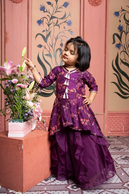Celebrate in style with this plum embroidered peplum top and layered lehenga set for girls - Kirti Agarwal