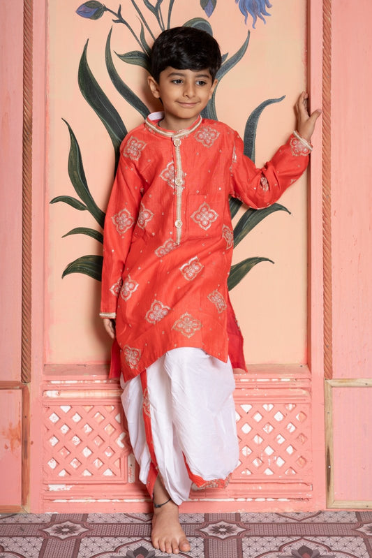 Rust - orange embroidered kurta paired with contrast white dhoti for a timeless festive statement. - Kirti Agarwal