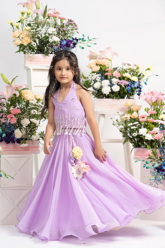 Elegant Embroidered Halter Top With Flowing Layered Lehenga And Statement Floral Latkan Detail