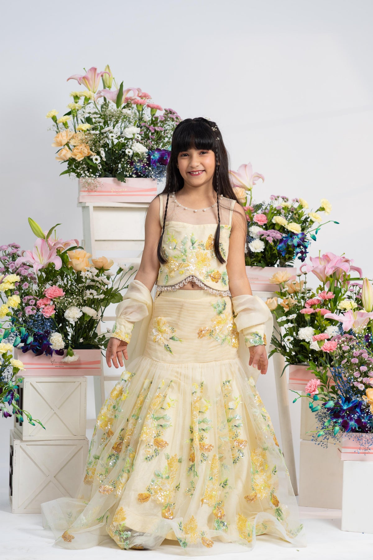 Stunning Floral Yellow Lehenga Set With Sheer Net Blouse And Organza Dupatta Detail