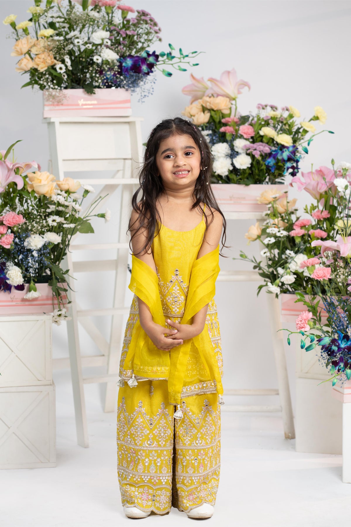 Bright yellow embroidered sharara set perfect for festive celebrations