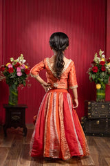Vibrant Orange Choli With Contrast Yoke And Panelled Flared Lehenga Set