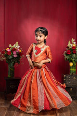 Vibrant Orange Choli With Contrast Yoke And Panelled Flared Lehenga Set