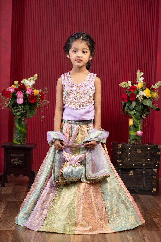 Intricate Embroidered Top And Brocade Lehenga With Matching Net Dupatta And Brocade Potli Bag