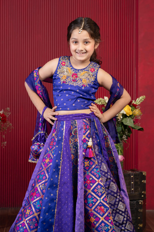 Gorgeous Embroidered Top And Brocade Lehenga With Matching Net Dupatta And Brocade Potli Bag