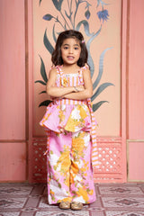 Add a burst of sunshine with this cheerful floral peplum top and pant co - ord set for girls - Kirti Agarwal