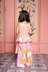 Add a burst of sunshine with this cheerful floral peplum top and pant co - ord set for girls - Kirti Agarwal