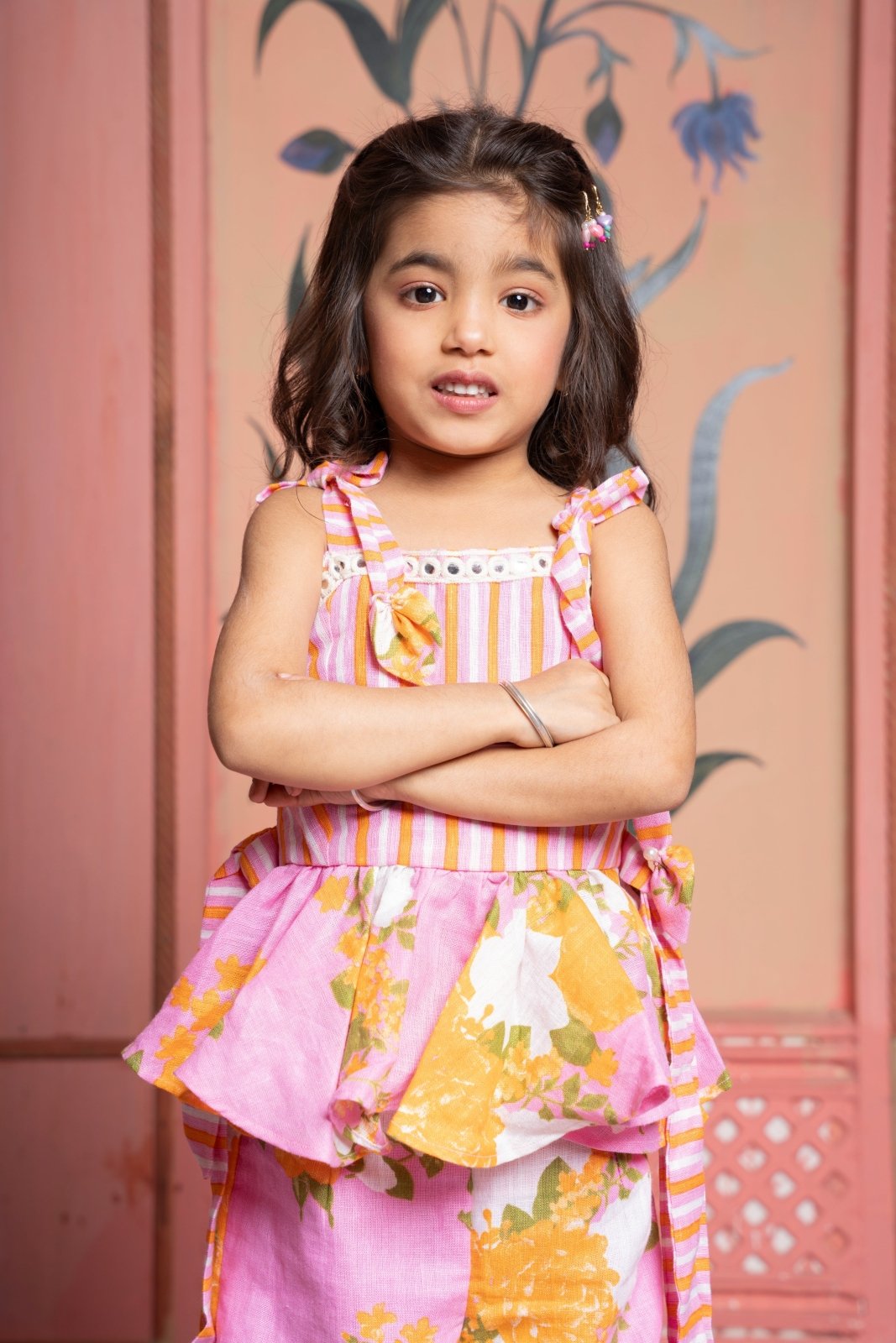 Add a burst of sunshine with this cheerful floral peplum top and pant co - ord set for girls - Kirti Agarwal