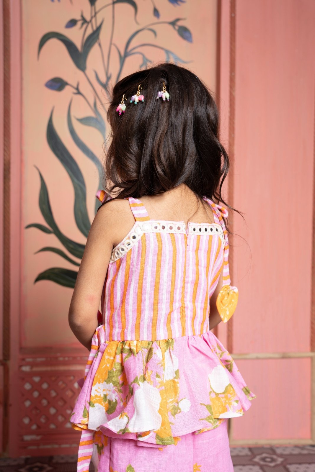 Add a burst of sunshine with this cheerful floral peplum top and pant co - ord set for girls - Kirti Agarwal