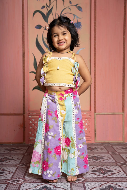 Add a pop of sunshine with this mustard crop top and floral paneled flared pants set for girls - Kirti Agarwal