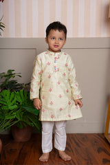 Add a splash of sunshine to your little one’s ethnic wardrobe with this pastel yellow floral kurta set - Kirti Agarwal