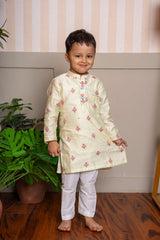 Add a splash of sunshine to your little one’s ethnic wardrobe with this pastel yellow floral kurta set - Kirti Agarwal