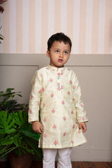Add a splash of sunshine to your little one’s ethnic wardrobe with this pastel yellow floral kurta set - Kirti Agarwal