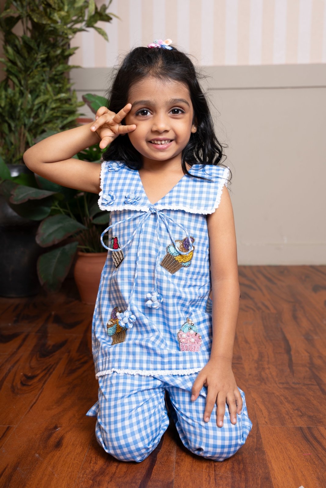 Adorable blue gingham co - ord set with playful patchwork and lace details — a perfect everyday outfit for your little trendsetter. - Kirti Agarwal