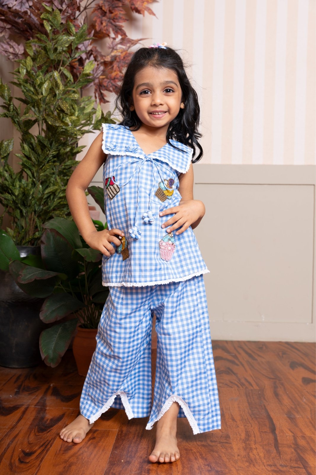Adorable blue gingham co - ord set with playful patchwork and lace details — a perfect everyday outfit for your little trendsetter. - Kirti Agarwal