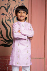 Blush pink embroidered kurta with white churidar – a timeless festive essential for boys. - Kirti Agarwal