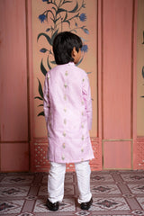 Blush pink embroidered kurta with white churidar – a timeless festive essential for boys. - Kirti Agarwal