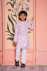 Blush pink embroidered kurta with white churidar – a timeless festive essential for boys. - Kirti Agarwal