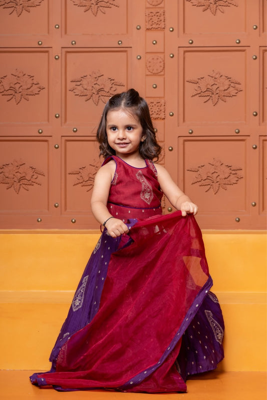 Bring festive elegance to her look with this maroon crop top and purple lehenga set for girls. - Kirti Agarwal