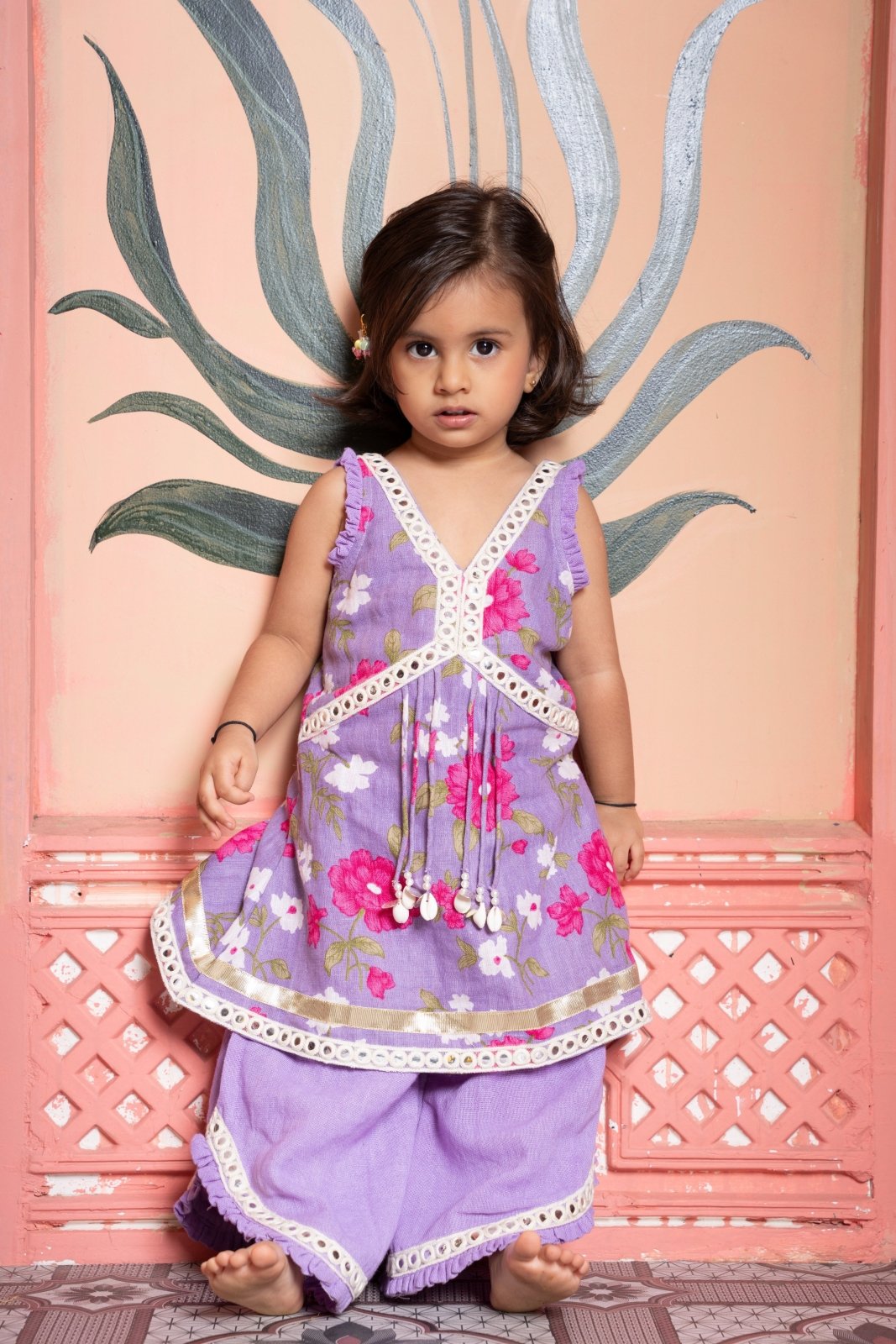 Charming lavender floral set with tassel kurti and flared pants—perfect for festive twirls! - Kirti Agarwal