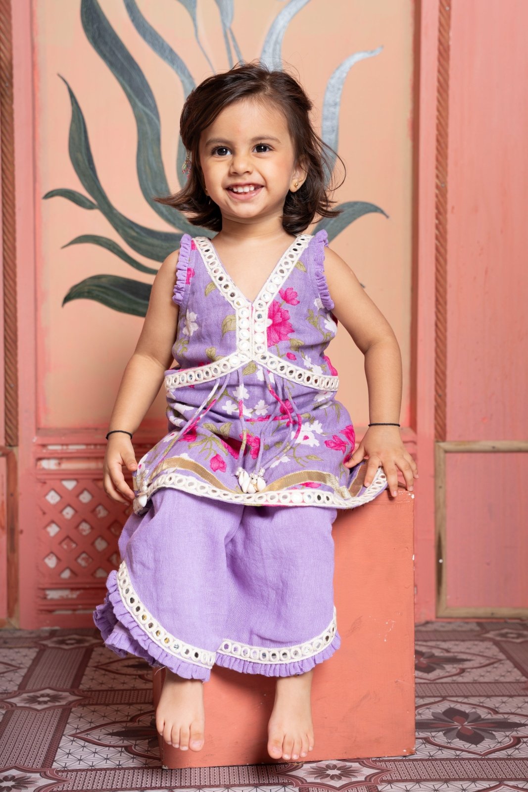 Charming lavender floral set with tassel kurti and flared pants—perfect for festive twirls! - Kirti Agarwal