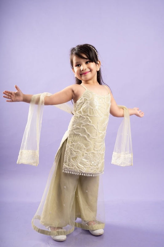 Charming pastel yellow ensemble with floral embroidery and flowing palazzo pants, perfect for a cheerful and elegant look at festive occasions - Kirti Agarwal