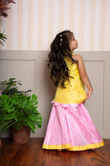 Charming yellow halter - neck kurti with scalloped hem and pink palazzo set, perfect for festive celebrations. - Kirti Agarwal