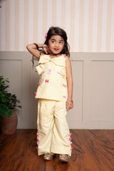 Charming yellow striped coord set with bow accents — a cheerful and comfy pick for your little fashionista. - Kirti Agarwal
