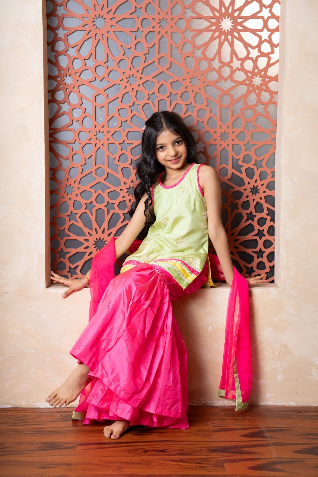 Chic pink and green sharara set with embroidered kurti and contrast dupatta — a perfect festive pick for young girls. - Kirti Agarwal