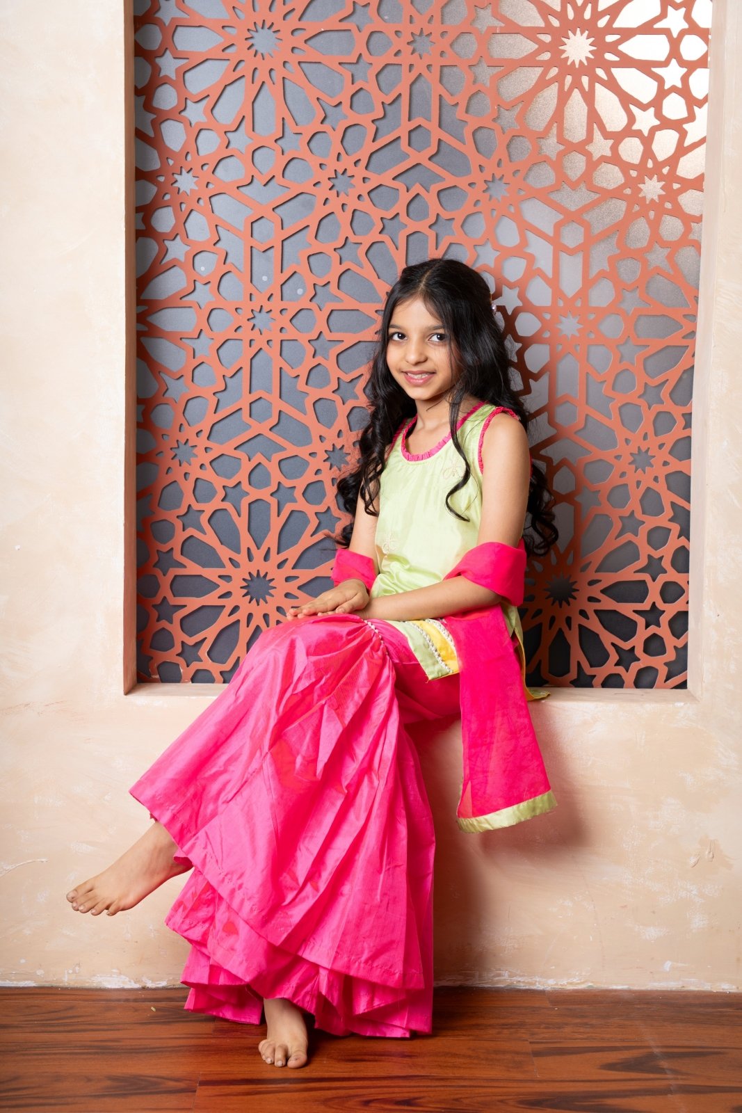 Chic pink and green sharara set with embroidered kurti and contrast dupatta — a perfect festive pick for young girls. - Kirti Agarwal