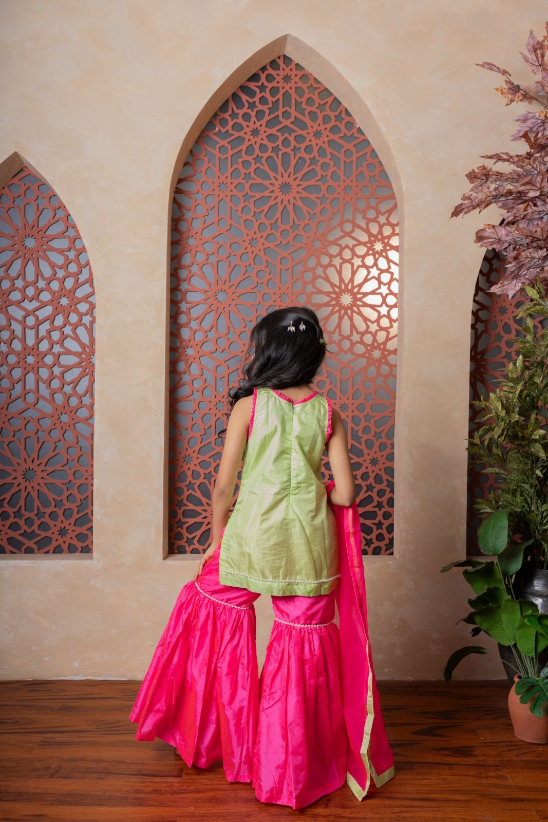 Chic pink and green sharara set with embroidered kurti and contrast dupatta — a perfect festive pick for young girls. - Kirti Agarwal