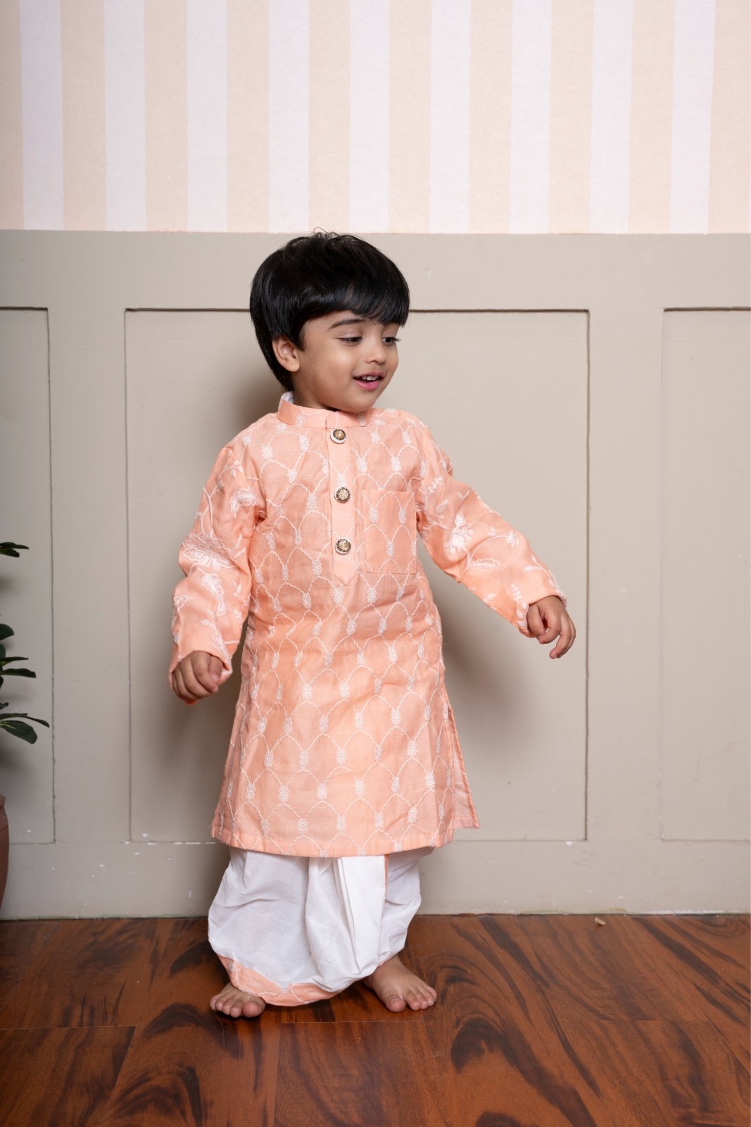 Classic peach embroidered kurta with dhoti – a perfect blend of charm and tradition - Kirti Agarwal