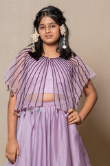 Elegant Lavender ensemble with a beaded cape and layered skirt, perfect for a graceful and sophisticated look at any special occasion. - Kirti Agarwal