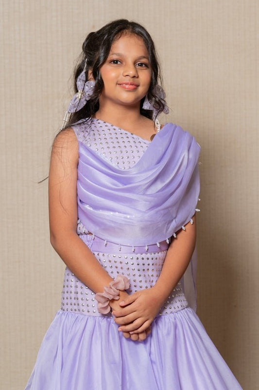 Elegant Lavender mermaid gown with sparkling embellishments and a draped neckline, perfect for a sophisticated look at any special event. - Kirti Agarwal