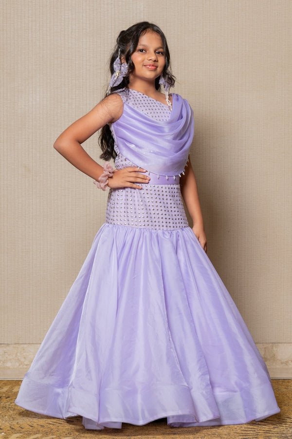 Elegant Lavender mermaid gown with sparkling embellishments and a draped neckline, perfect for a sophisticated look at any special event. - Kirti Agarwal