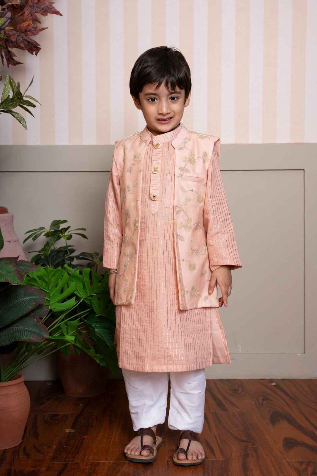 Elegant peach kurta set with embroidered Nehru jacket—perfect for festive flair and timeless charm. - Kirti Agarwal
