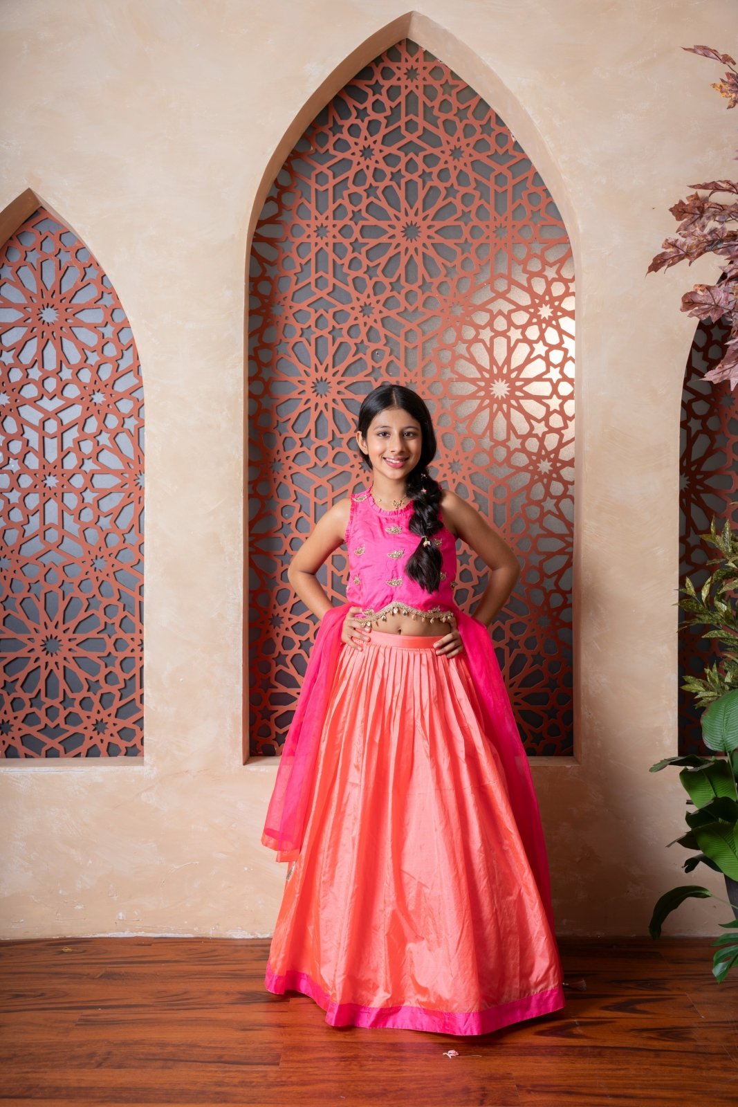 Elegant pink and orange lehenga set with intricate hand embroidery and tassel - detailed dupatta — perfect for festive occasions. - Kirti Agarwal
