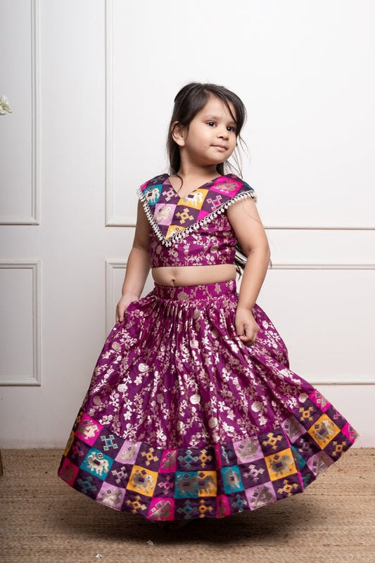 Elegant purple lehenga set with intricate golden floral motifs and multicolored patchwork accents for a festive look - Kirti Agarwal