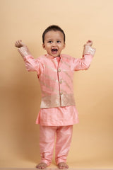 Elegant soft Peach kurta set with a regal golden - detailed jacket for a charming festive look - Kirti Agarwal