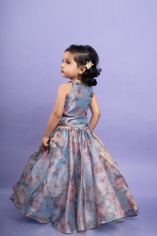 Enchanting pastel floral dress with gold sequin detailing and a flowy skirt, perfect for special occasions. - Kirti Agarwal