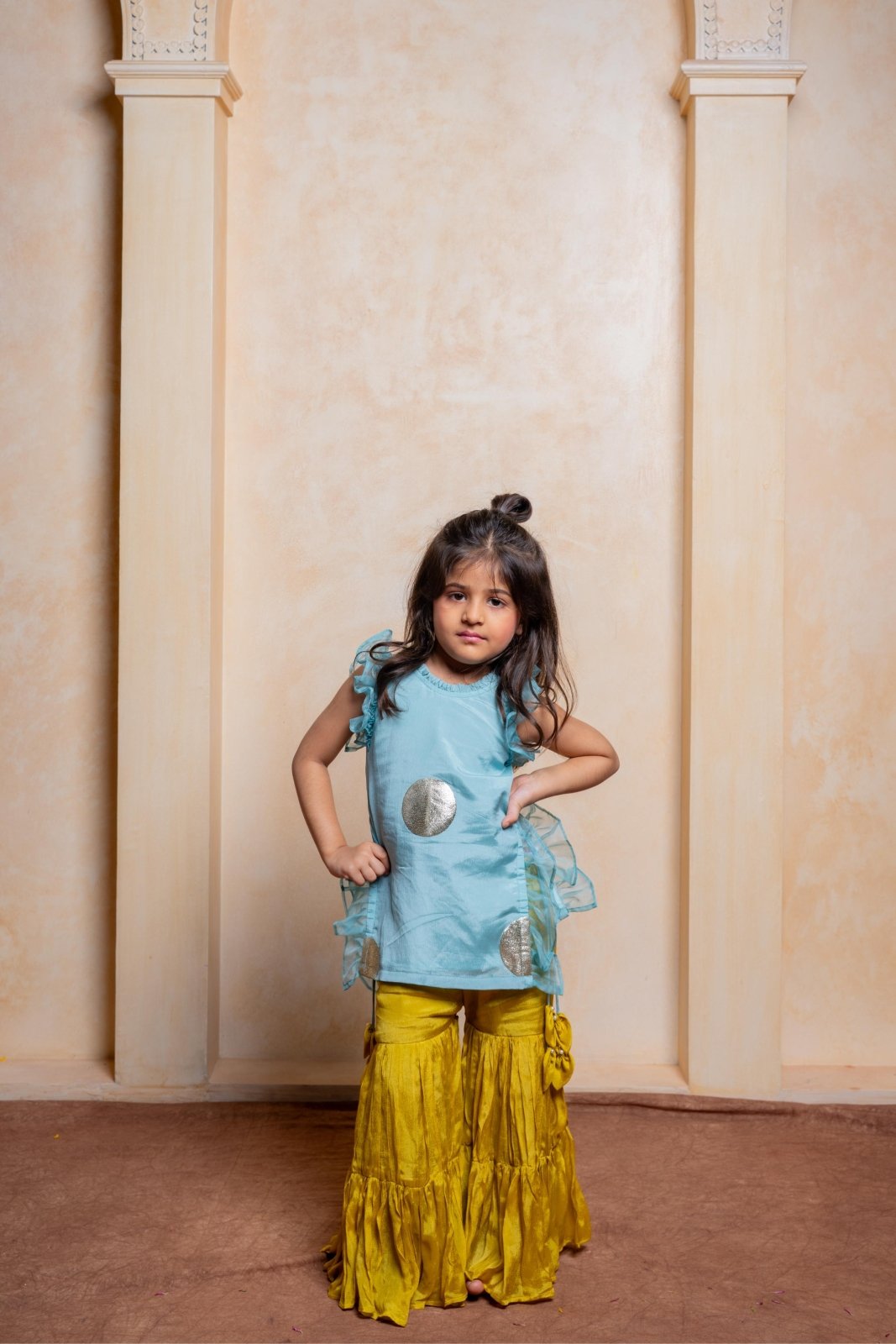 Let your little diva shine in this trendy crepe tunic and chiffon sharara set — a perfect pick for festive celebrations and special occasions - Kirti Agarwal