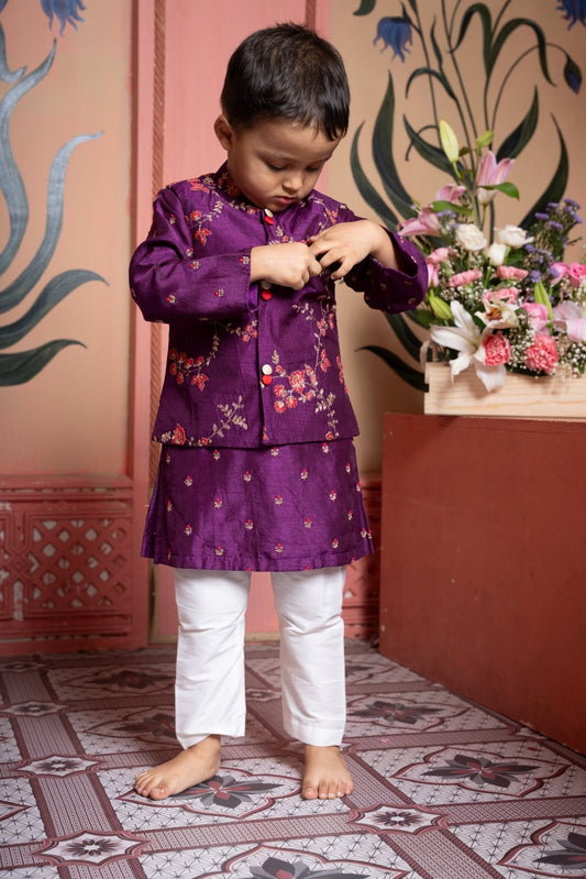 Let your little one shine in this elegant purple kurta set with floral jacket and classic white pants - Kirti Agarwal