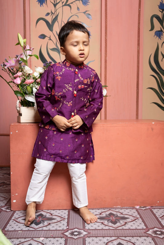 Let your little one shine in this elegant purple kurta set with floral jacket and classic white pants - Kirti Agarwal
