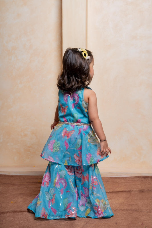 Make festive moments magical with this aqua floral peplum top and skirt set for girls - Kirti Agarwal