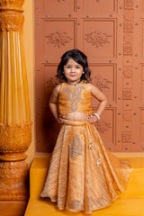 Mustard Tissue Silk lehenga choli with exquisite hand embroidery – a festive delight for your little one! - Kirti Agarwal