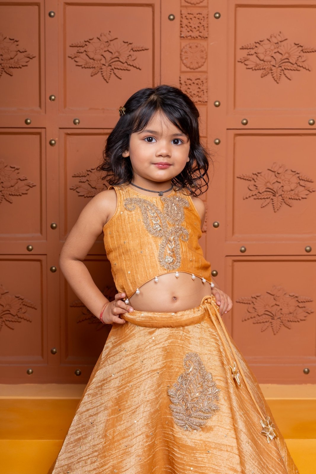 Mustard Tissue Silk lehenga choli with exquisite hand embroidery – a festive delight for your little one! - Kirti Agarwal
