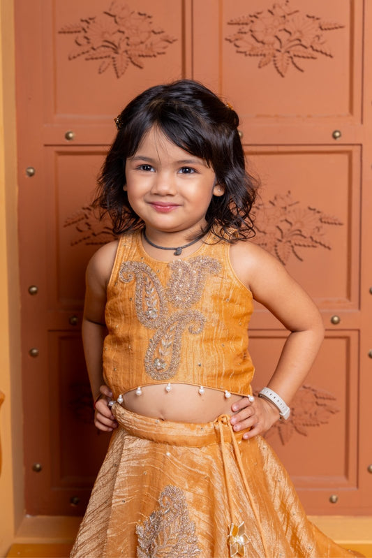 Mustard Tissue Silk lehenga choli with exquisite hand embroidery – a festive delight for your little one! - Kirti Agarwal