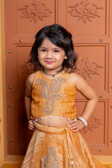 Mustard Tissue Silk lehenga choli with exquisite hand embroidery – a festive delight for your little one! - Kirti Agarwal