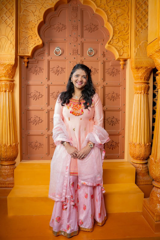 Radiate festive elegance in this pastel Chanderi Silk and Modal Silk sharara set with an Organza dupatta — perfect for celebrations and special occasions - Kirti Agarwal