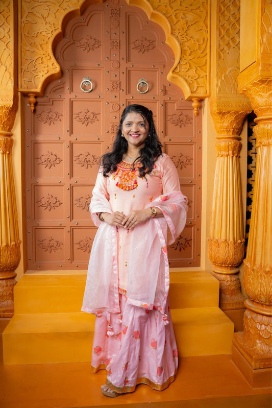 Radiate festive elegance in this pastel Chanderi Silk and Modal Silk sharara set with an Organza dupatta — perfect for celebrations and special occasions - Kirti Agarwal
